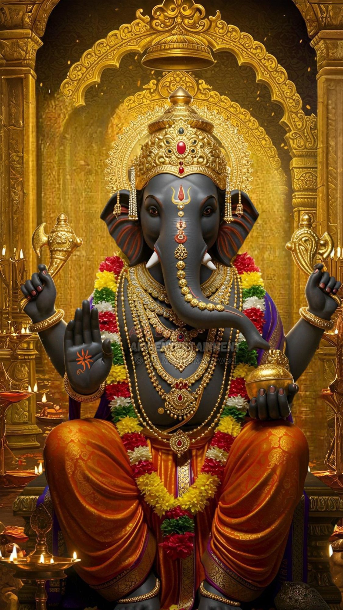 Lord Ganesha in golden royal attire