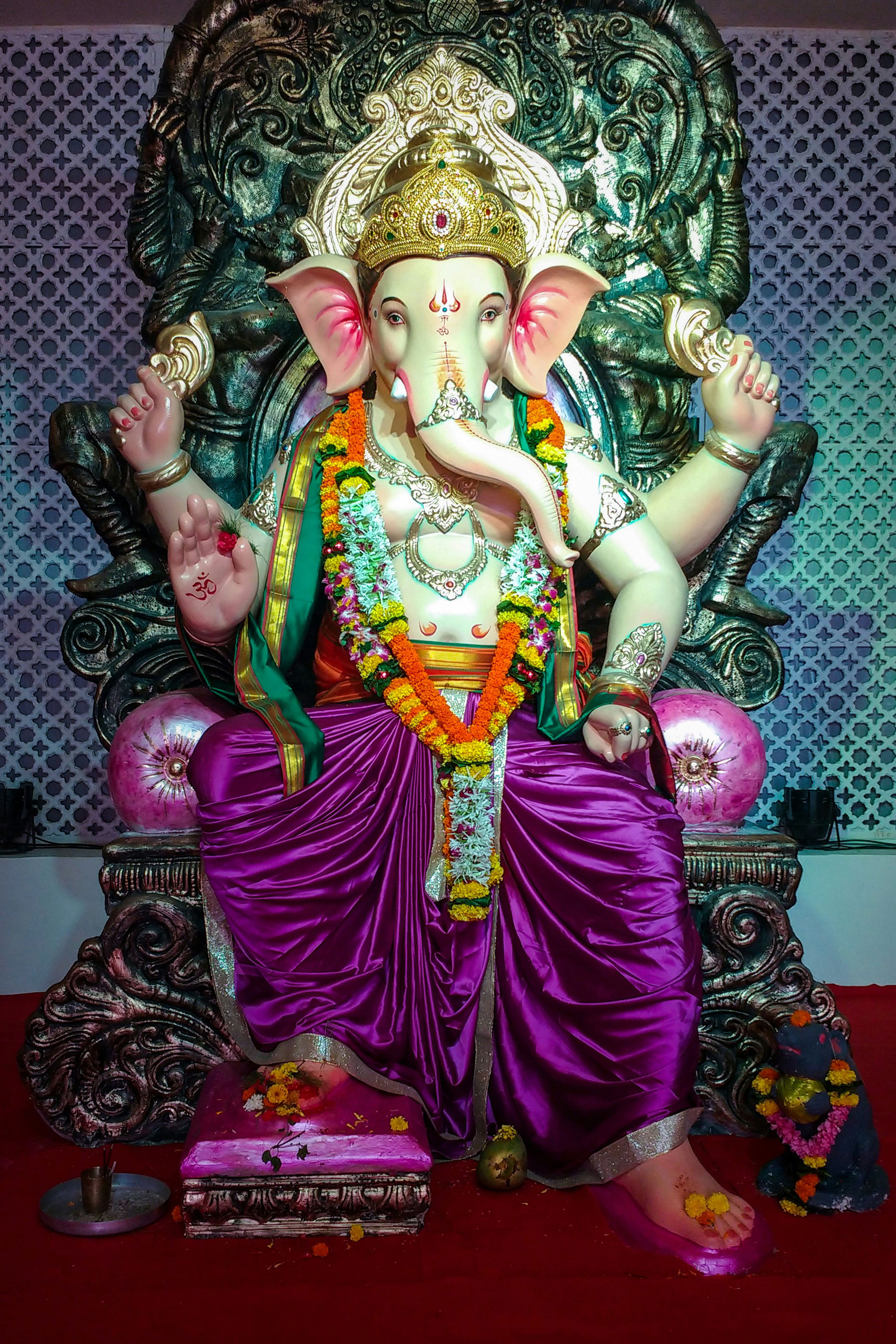 Lord Ganesha seated on a throne