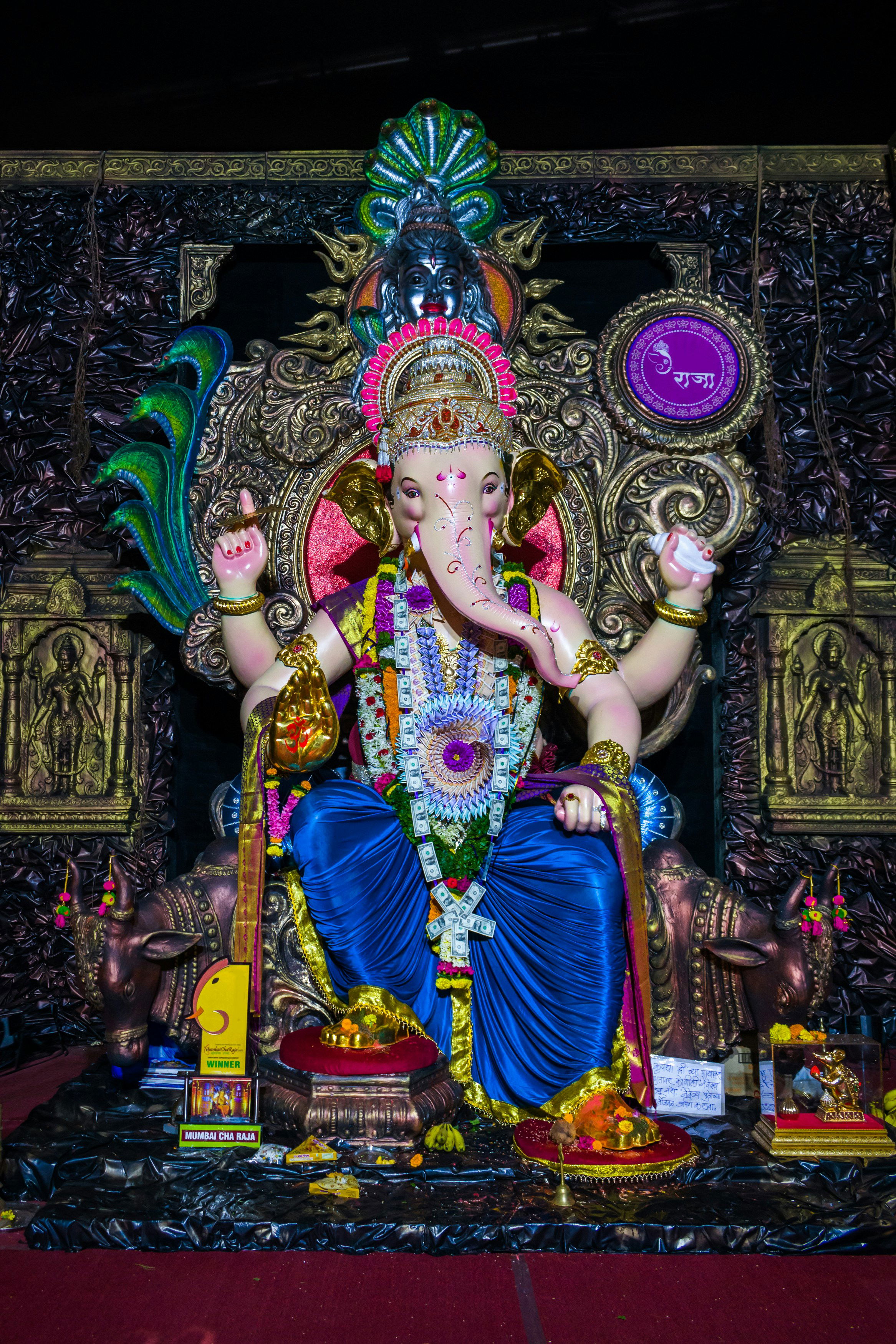 Ganesha seated on ornate throne