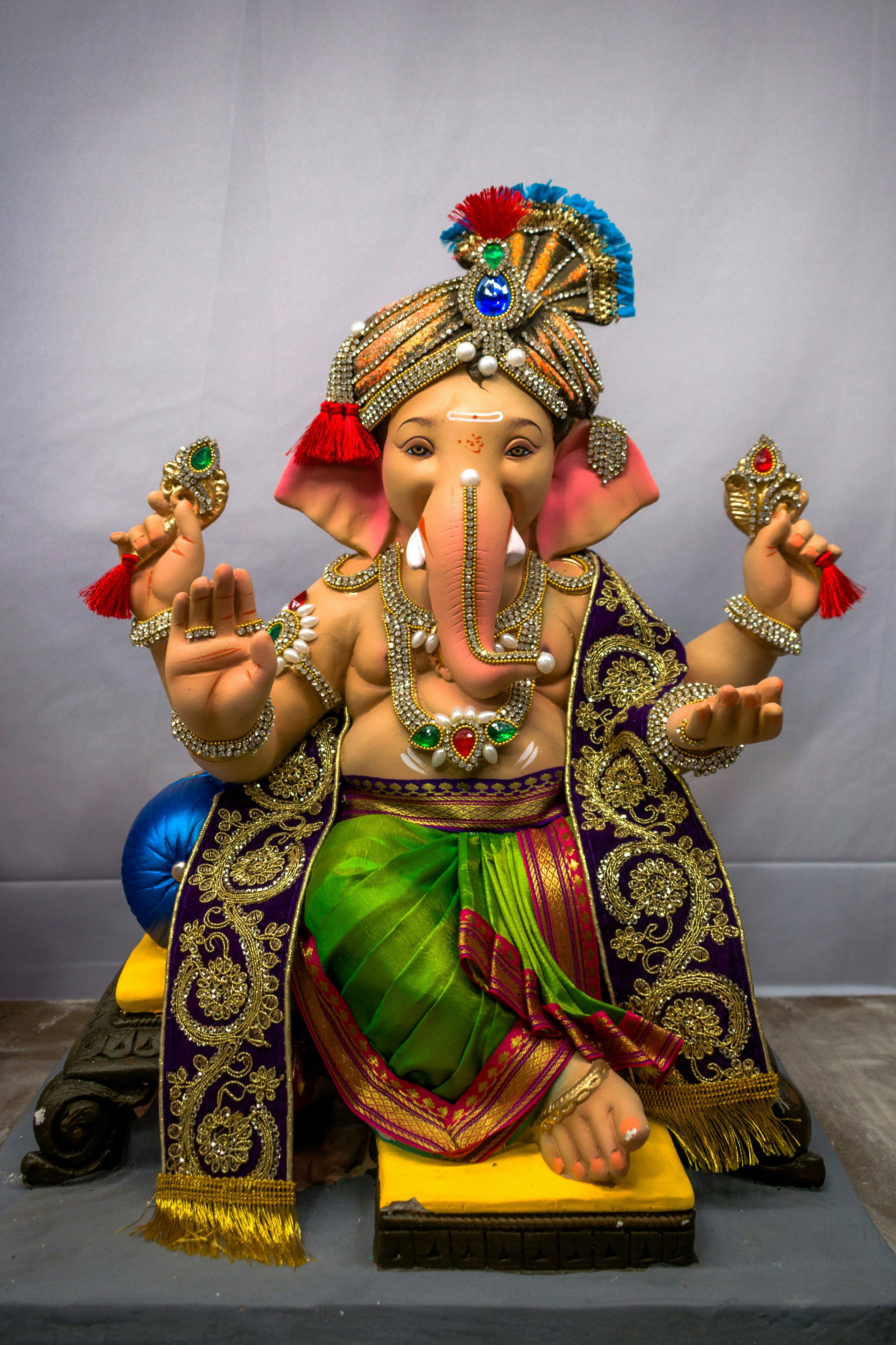 Ornate Ganesha statue in regal pose