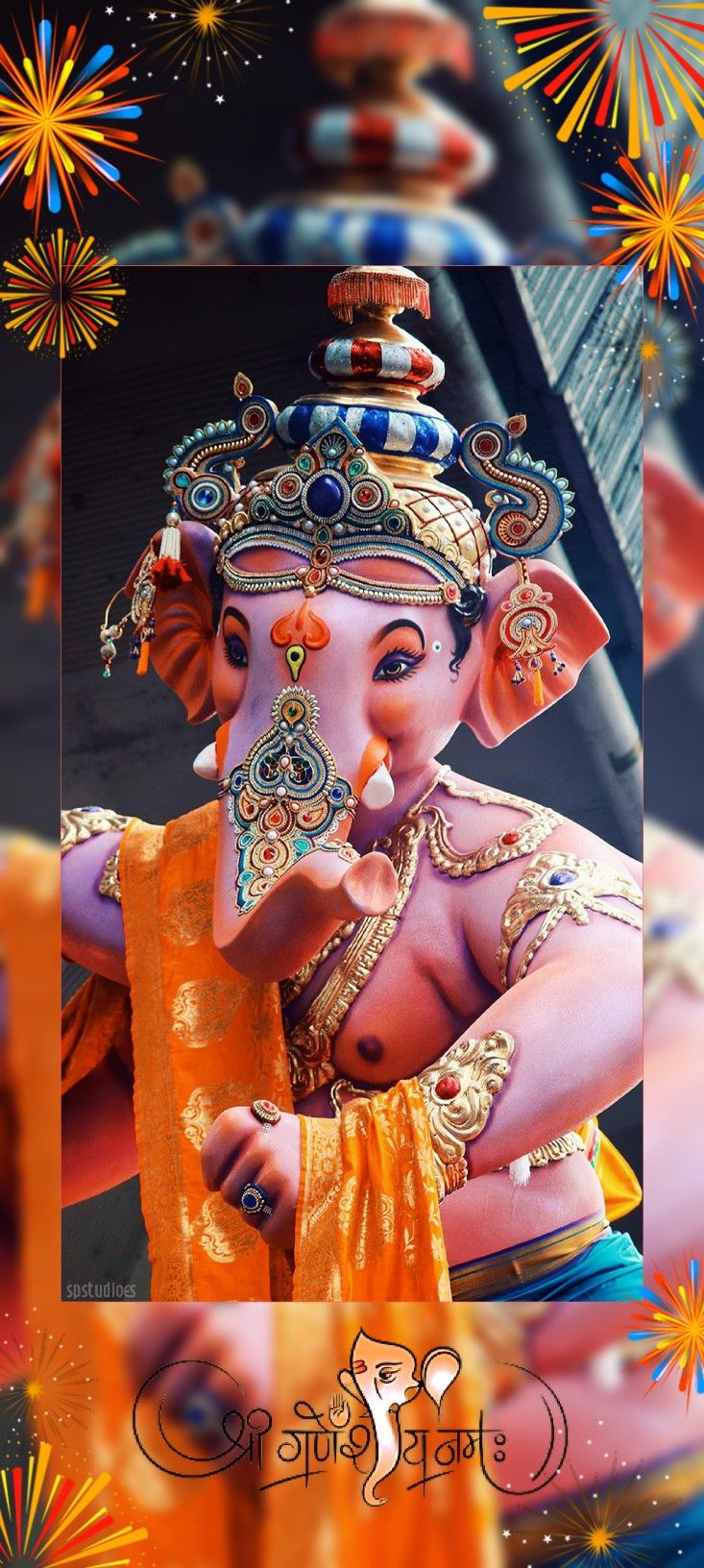 Lord Ganesha with jeweled crown and modak