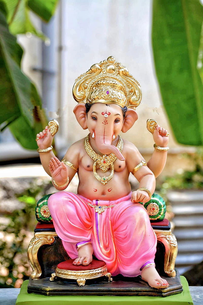 Lord Ganesha seated on a throne