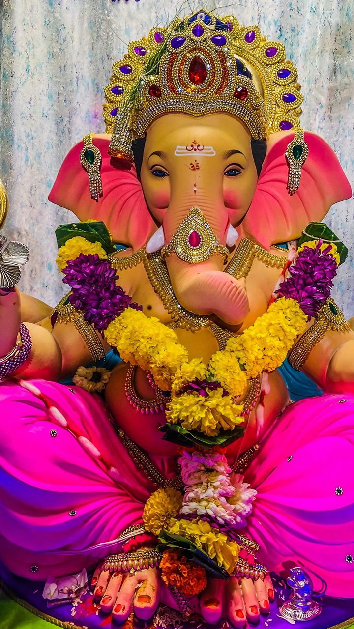 Lord Ganesha with flower garland