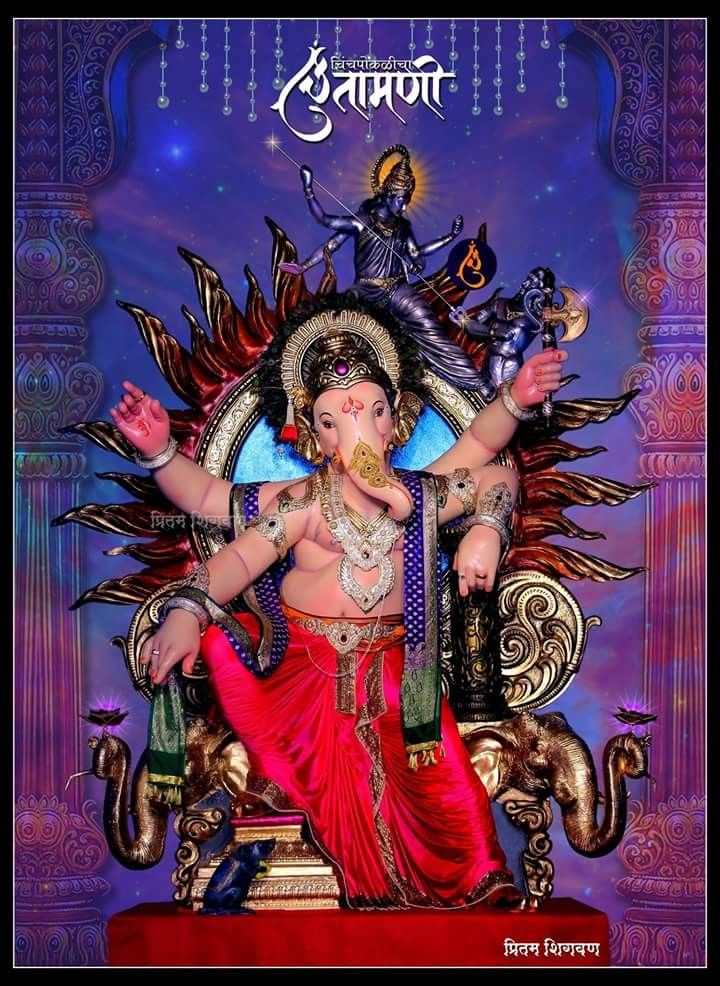 Lord Ganesha with modaks and mouse