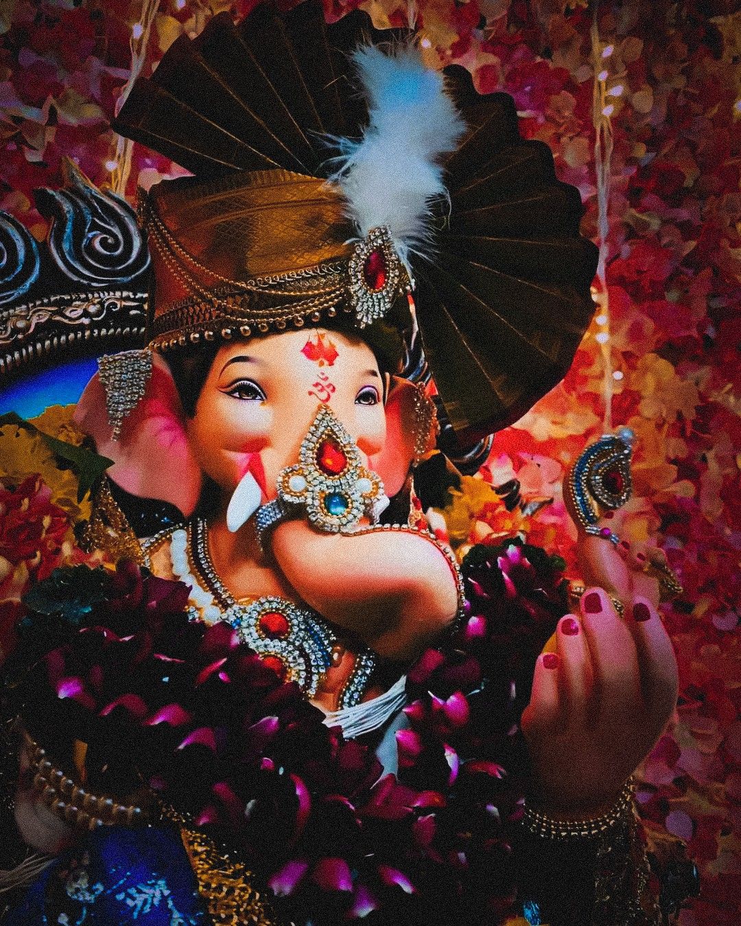 Lord Ganesha with floral decoration
