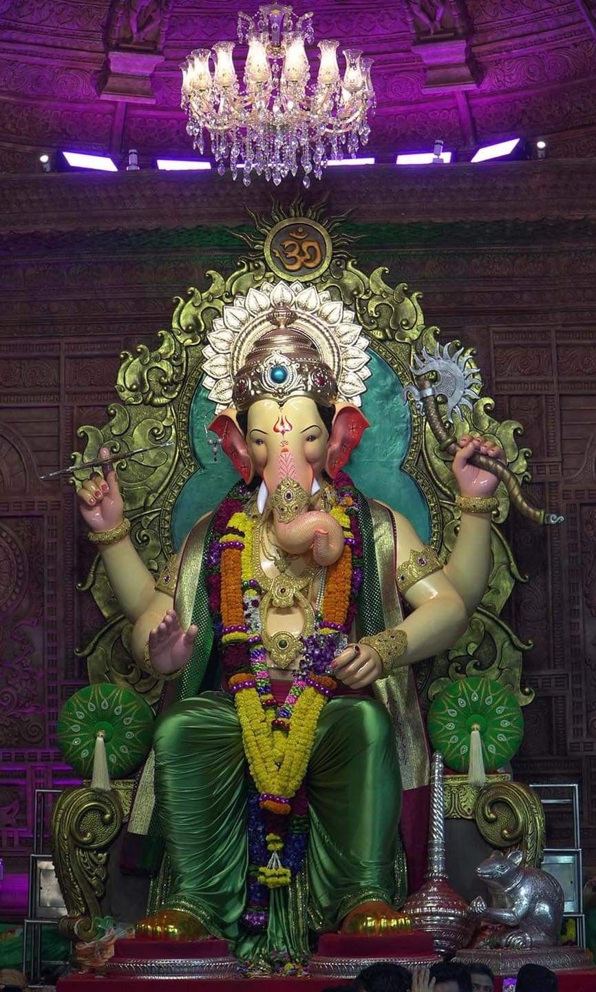 Lord Ganesha on ornate golden throne