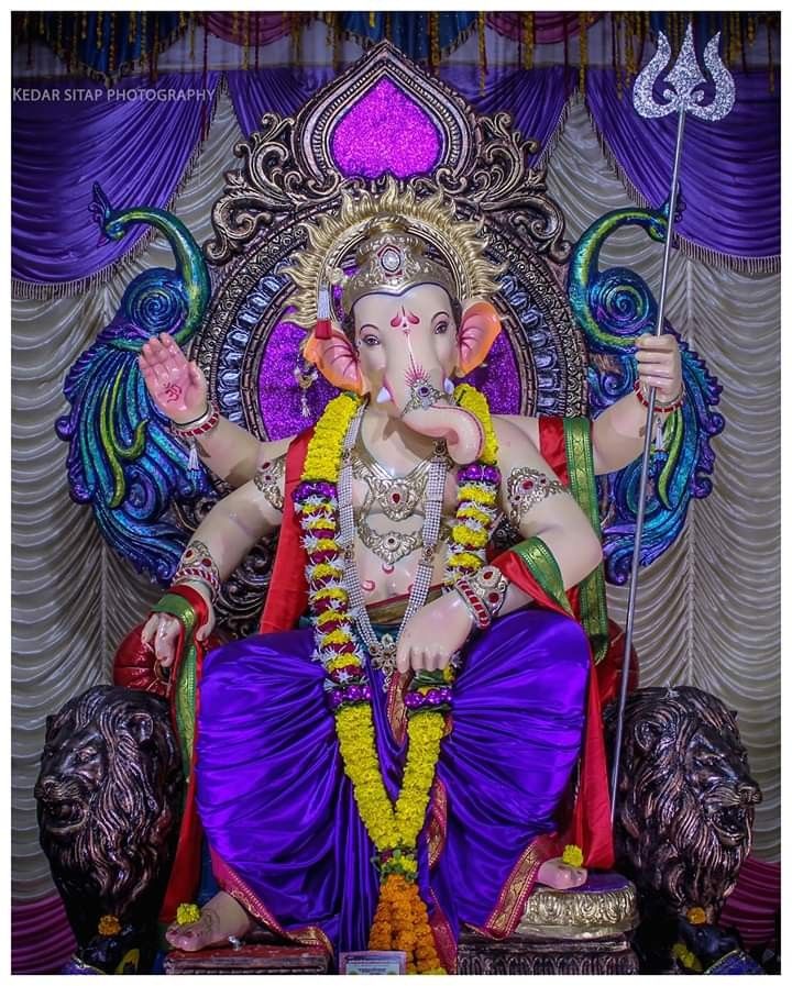 Lord Ganesha on a royal throne