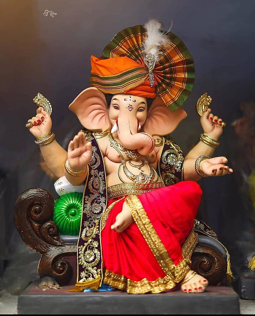 Lord Ganesha seated on a throne