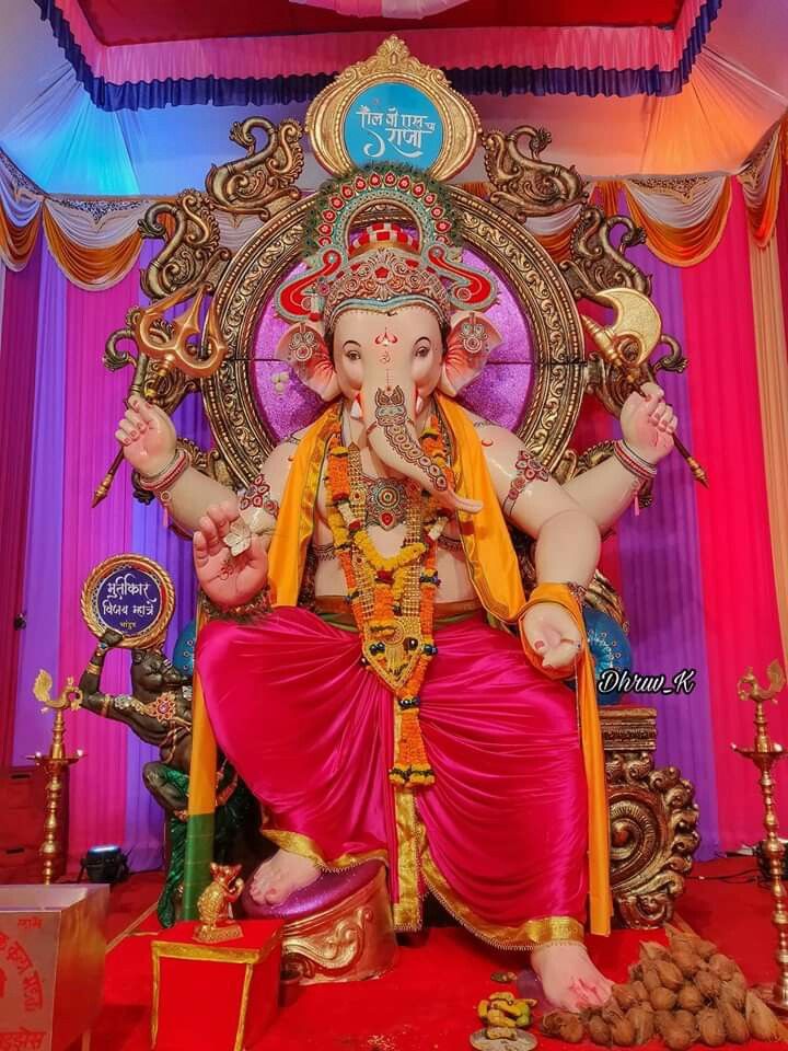 Golden Ganesha amidst festival decorations
