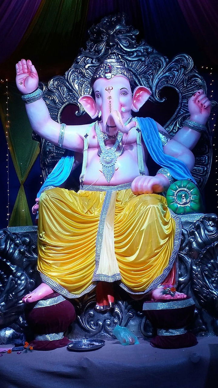 Lord Ganesha seated on a throne