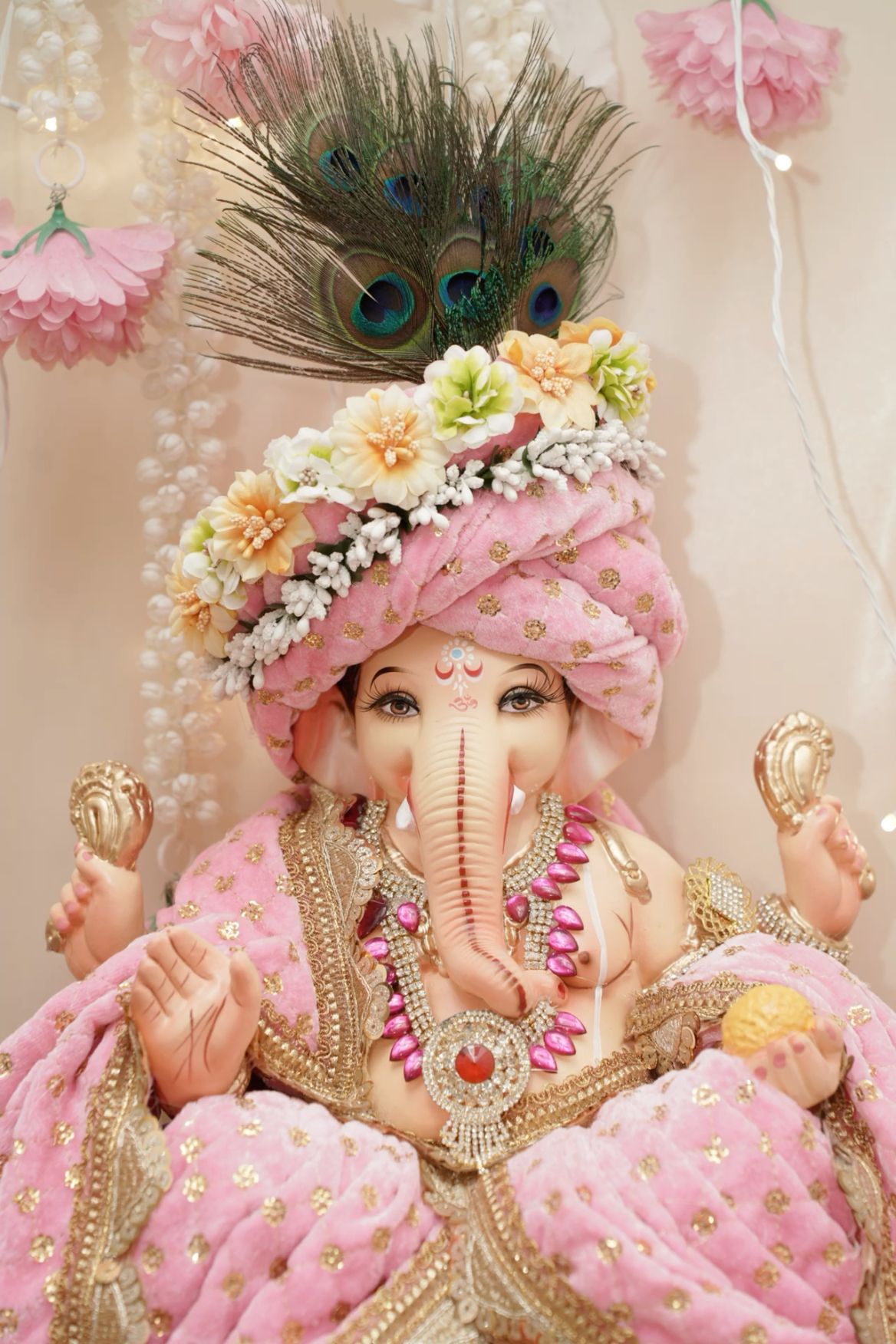 Pink floral Ganesha devotional image