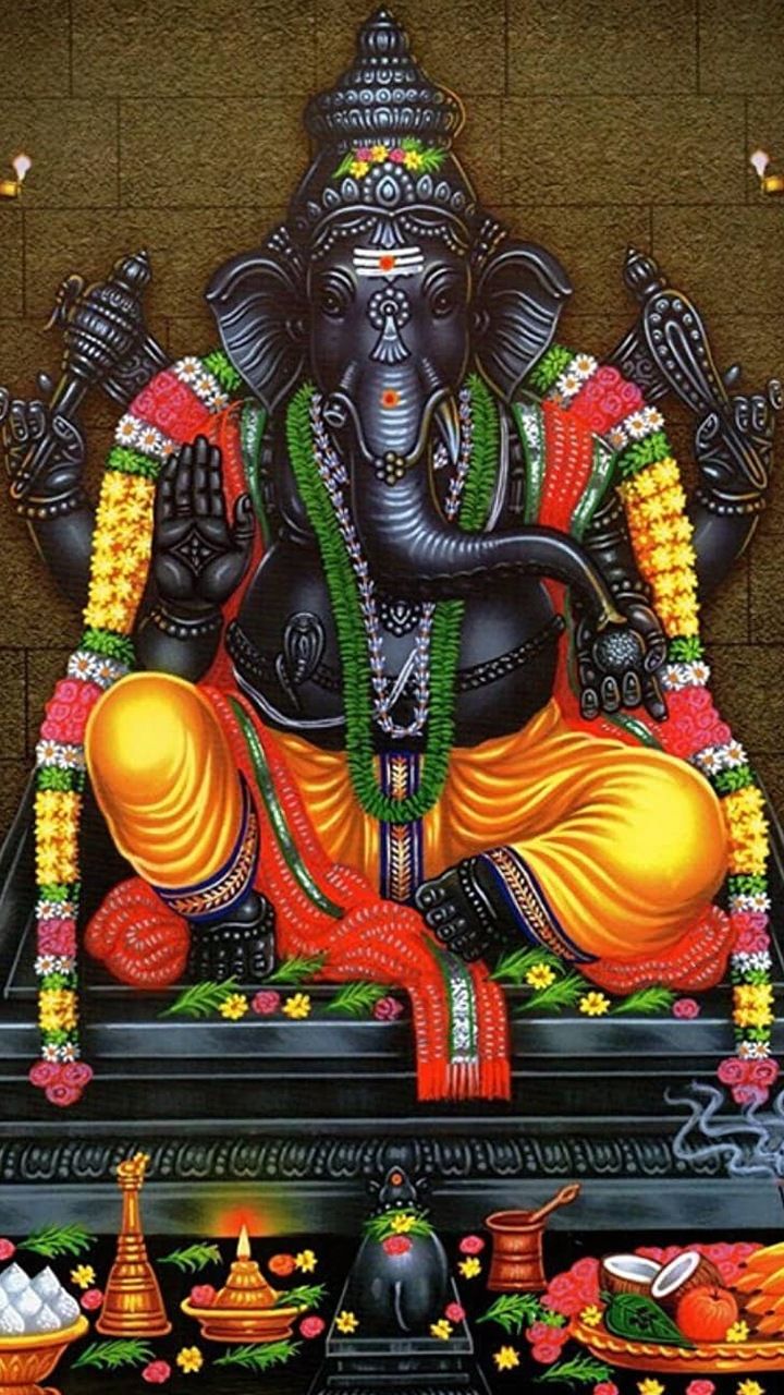 Lord Ganesha sitting in blessing pose