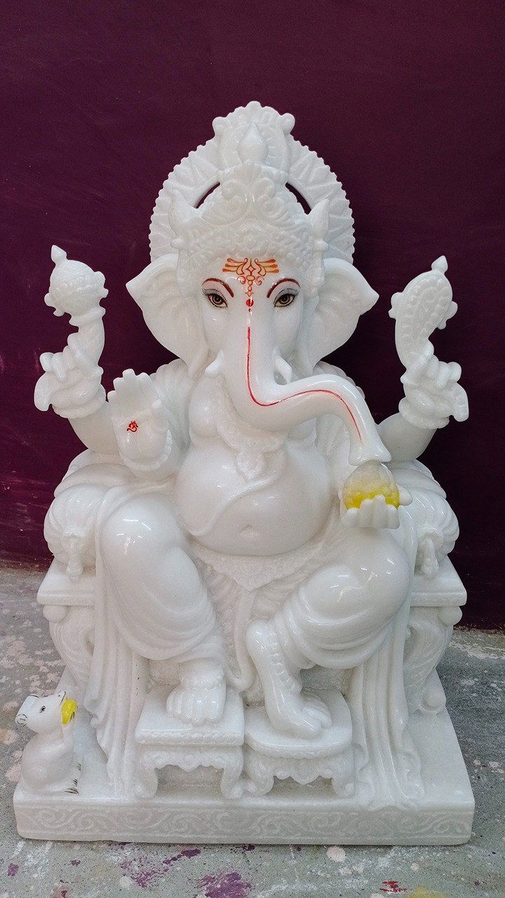White marble Ganesha statue, peaceful blessing