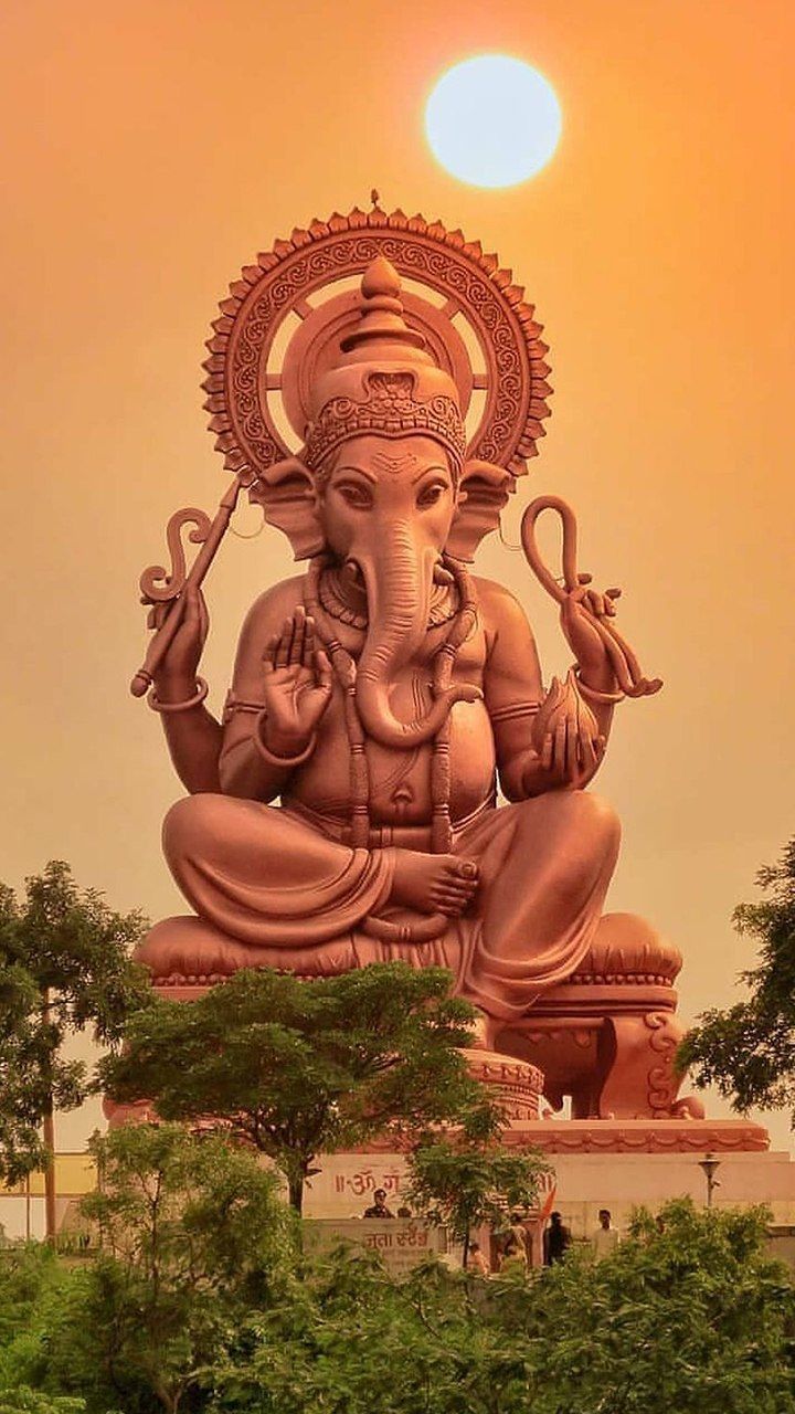 Ganesha statue during a sunset