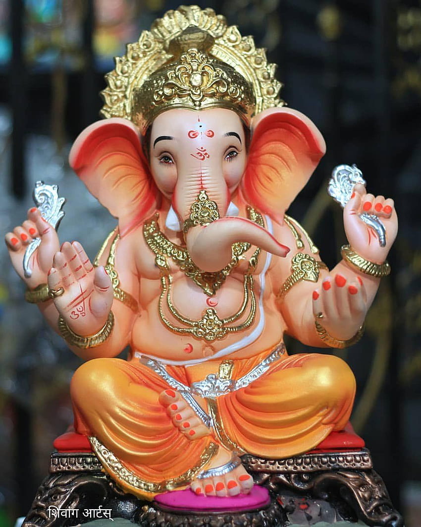 Lord Ganesha seated in blessing pose