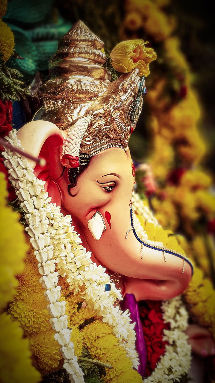 Ganesha adorned with fragrant flowers