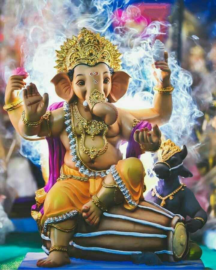 Lord Ganesha bestows blessings upon devotees.
