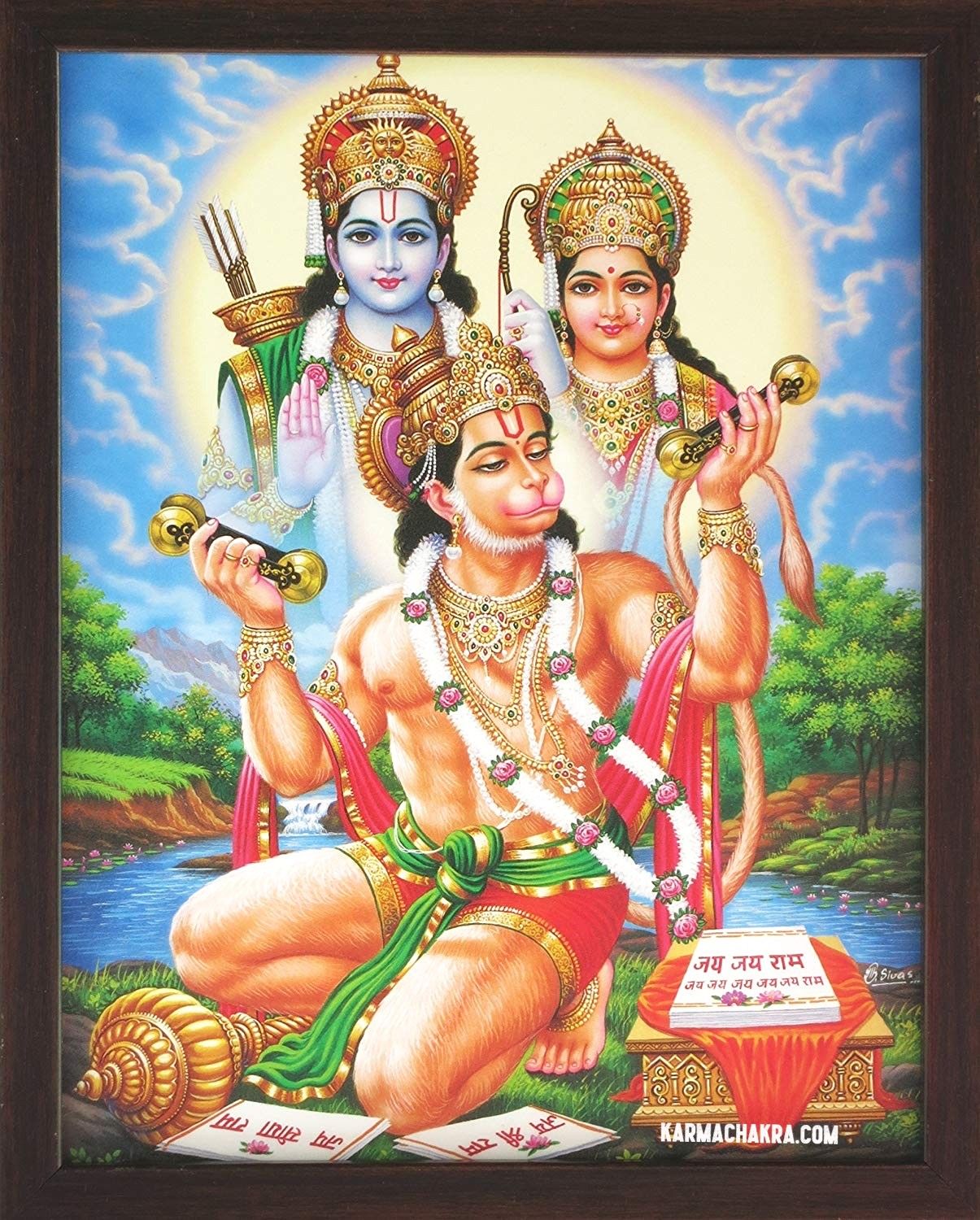 Hanuman kneels before Lord Ram and Sita.