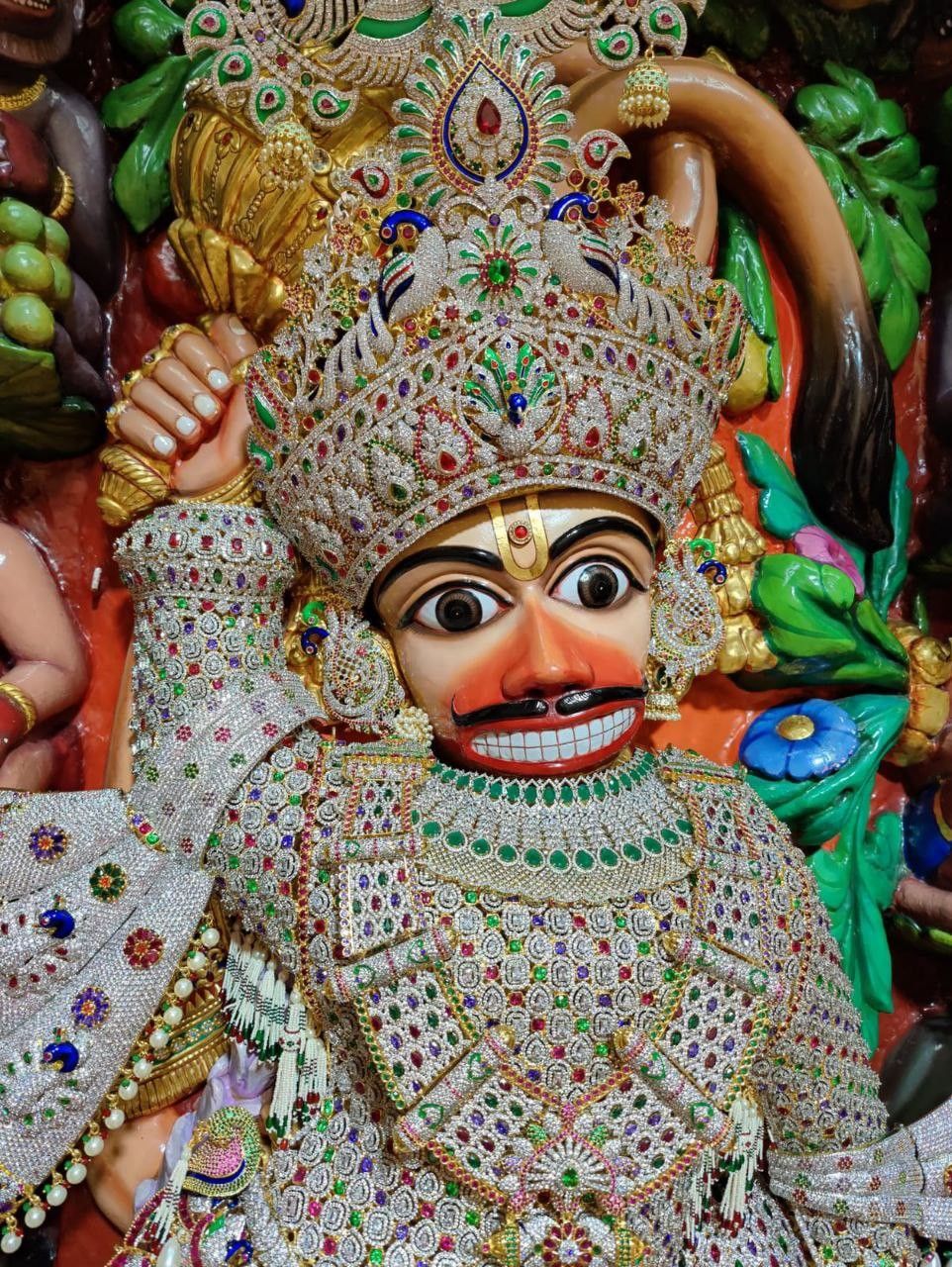 Ornate Hanuman portrait with mace