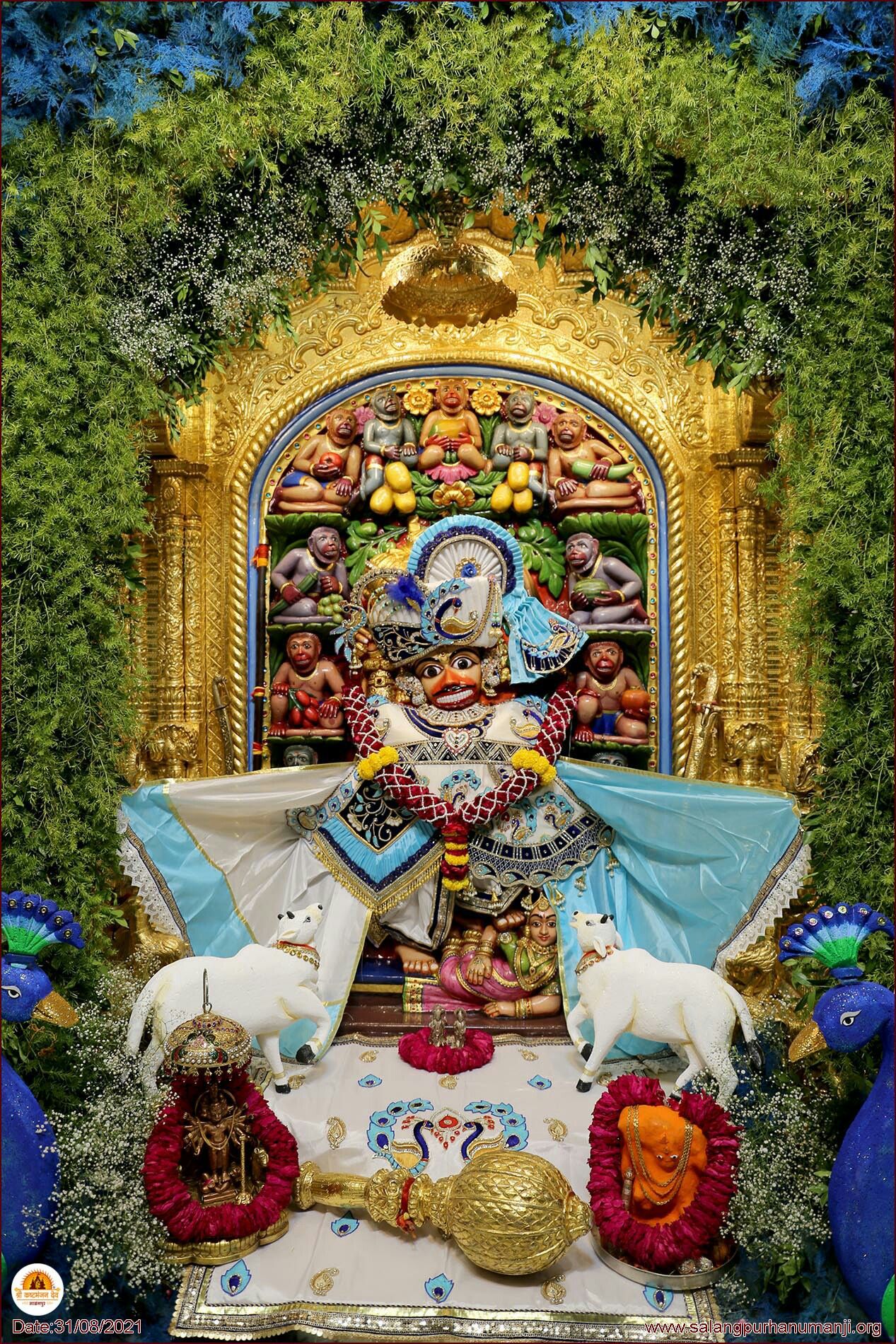 Hanumanji seated in ornate temple setting
