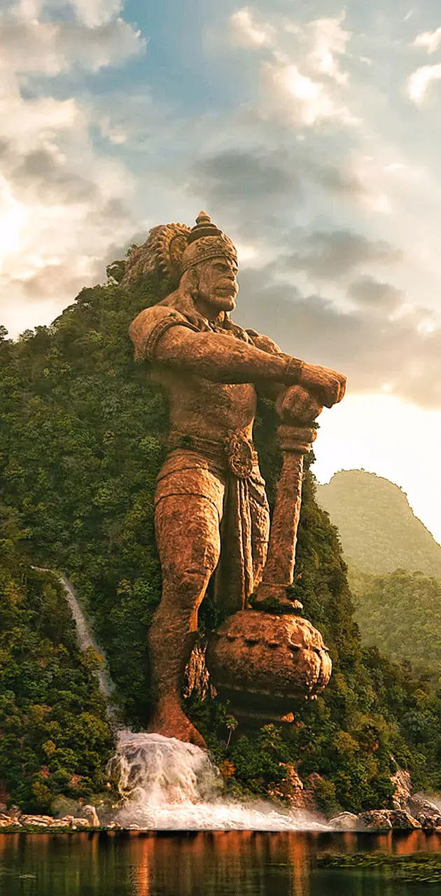 Hanuman stands with mountain, devotional statue
