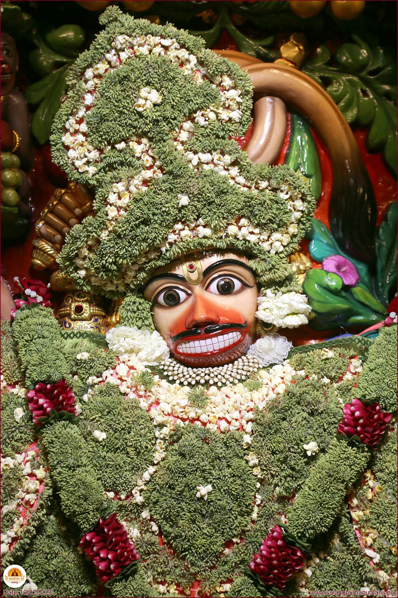 Hanuman Ji face adorned with flowers