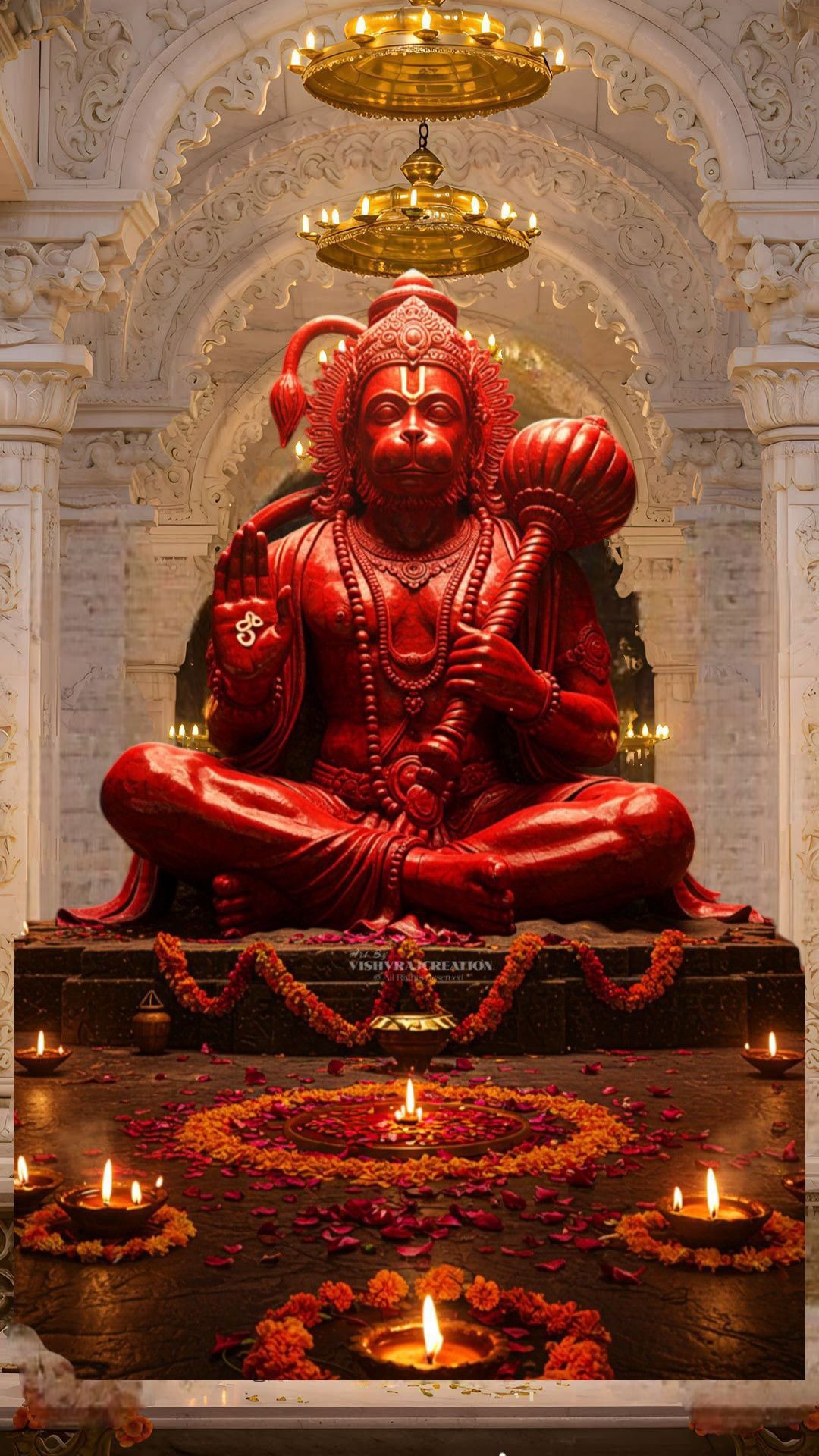 Hanuman statue in ornate temple setting
