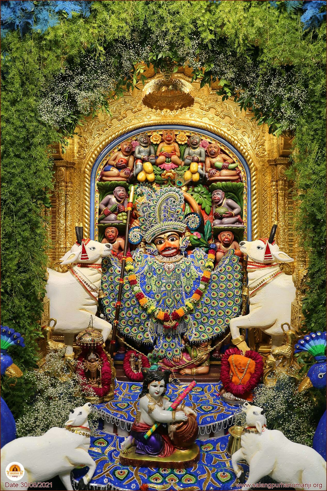 Majestic Hanuman seated on a golden throne