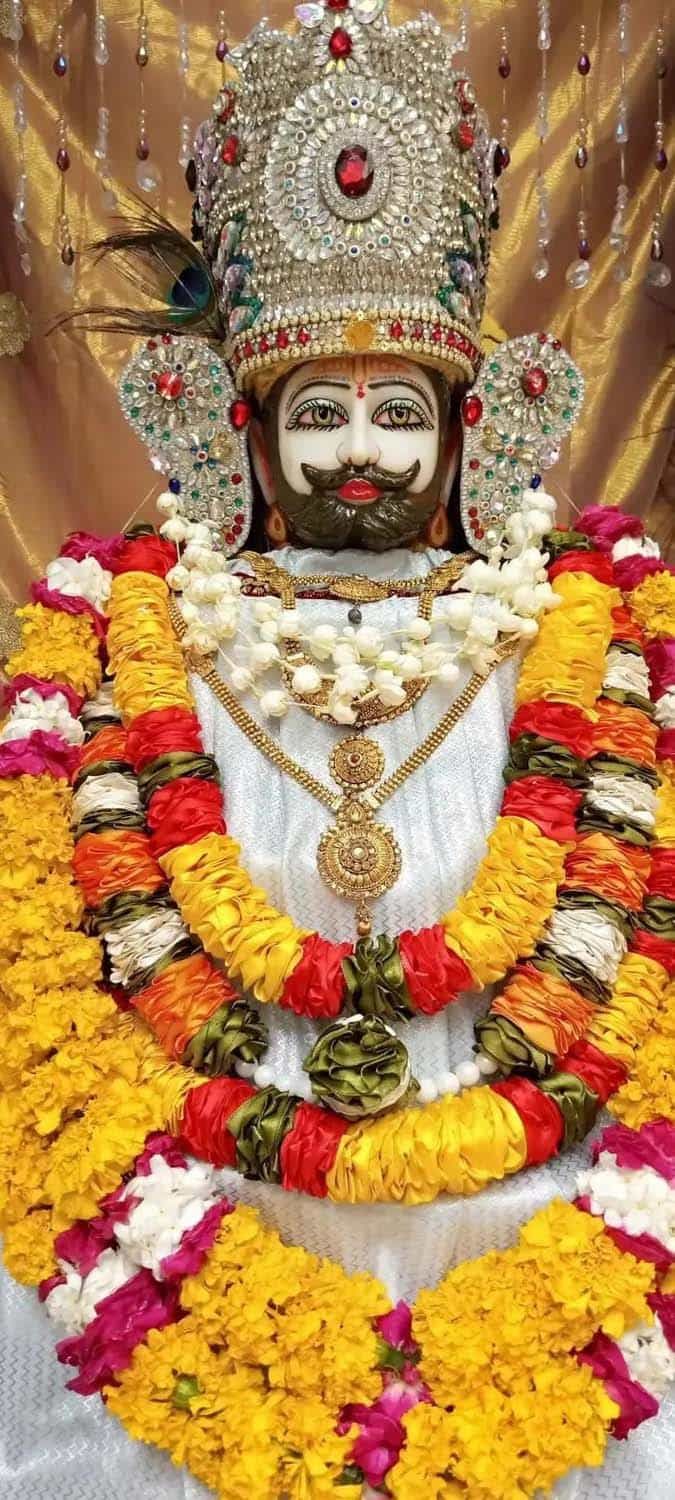 Khatu Shyam Baba with flower garland