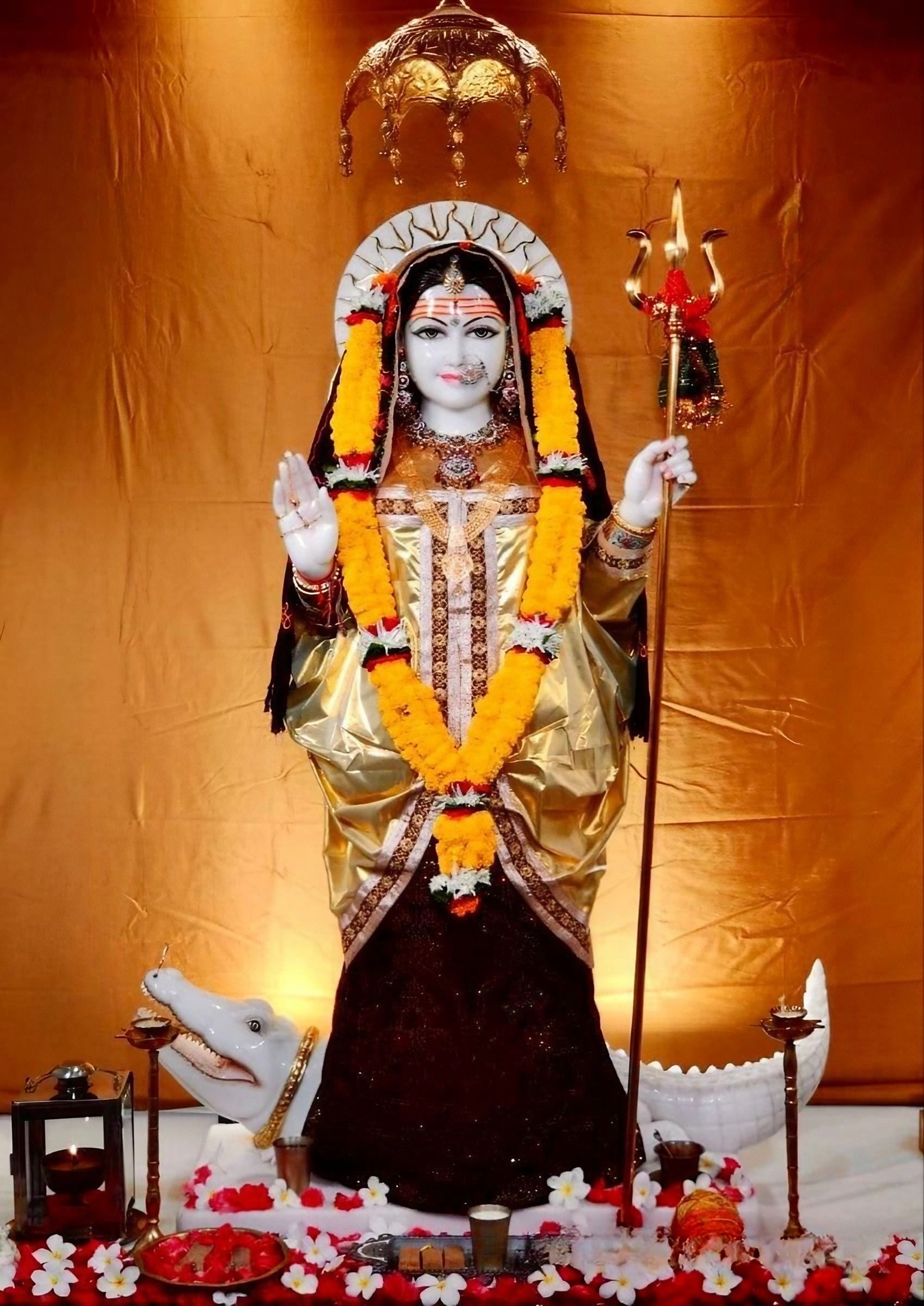 Khodiyar Maa with trident, golden idol