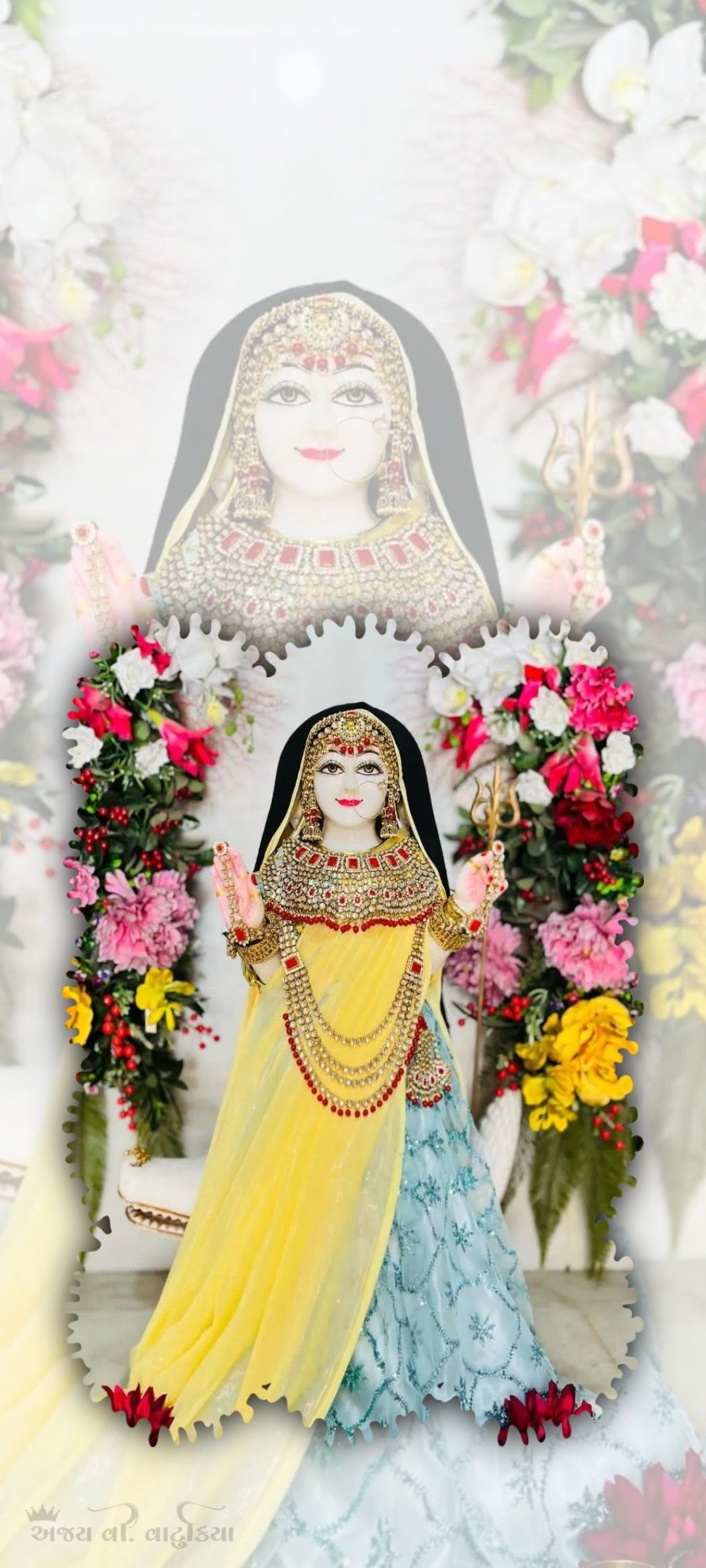 Khodiyar Maa with flowers and gold.