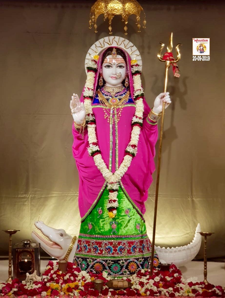 Khodiyar Maa with Trishul and flowers.