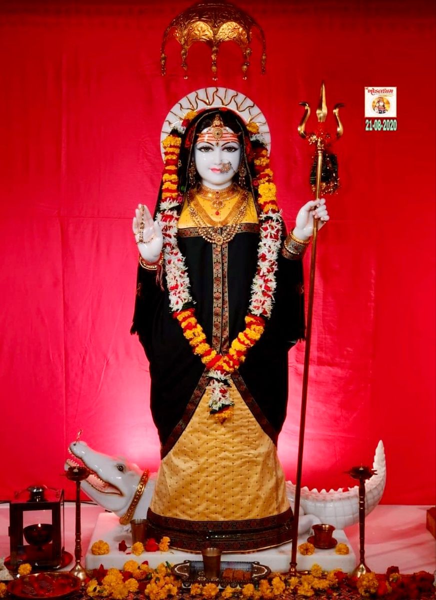 Khodiyar Maa with trident and floral garland