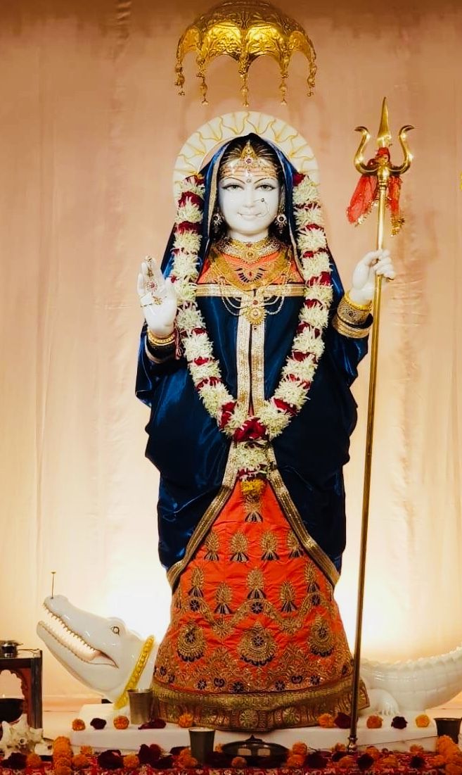 Khodiyar Maa statue adorned with flowers