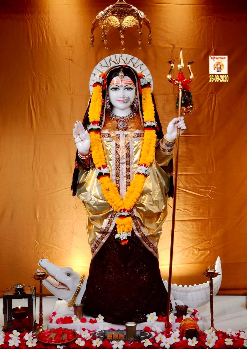 Khodiyar Maa statue with floral offerings