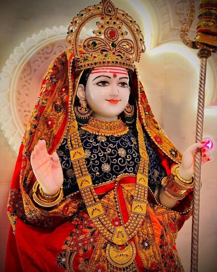 Khodiyar Maa in ornate red attire