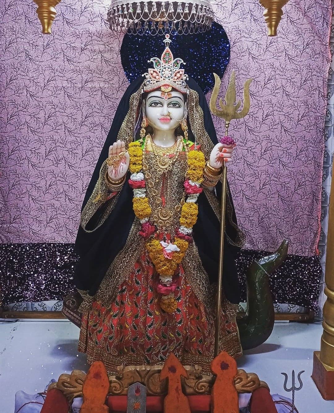 Khodiyar Maa holding a trident