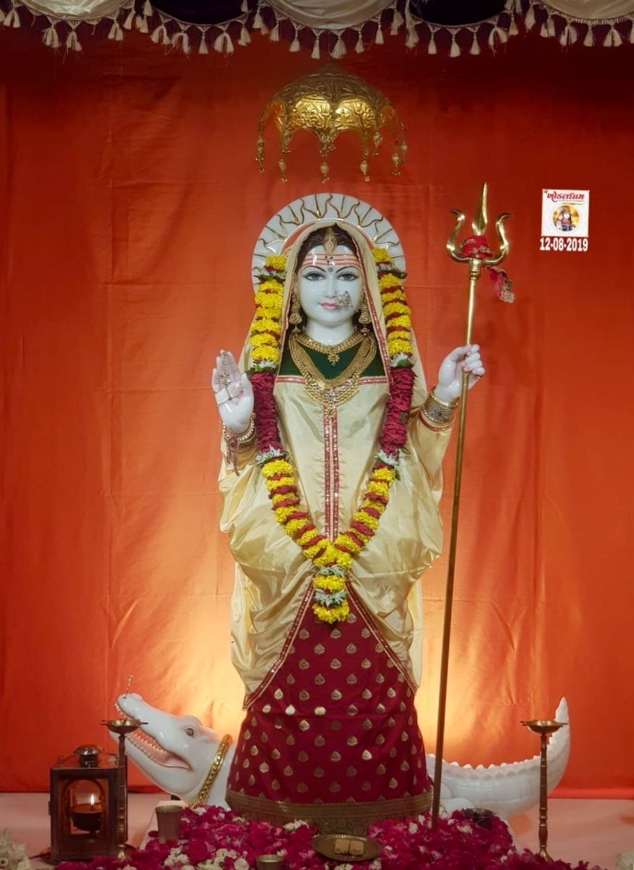 Khodiyar Maa with trident and flowers