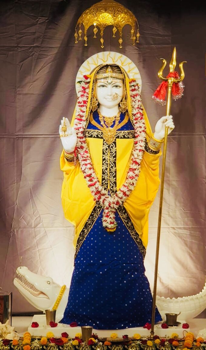 Khodiyar Maa in vibrant yellow attire