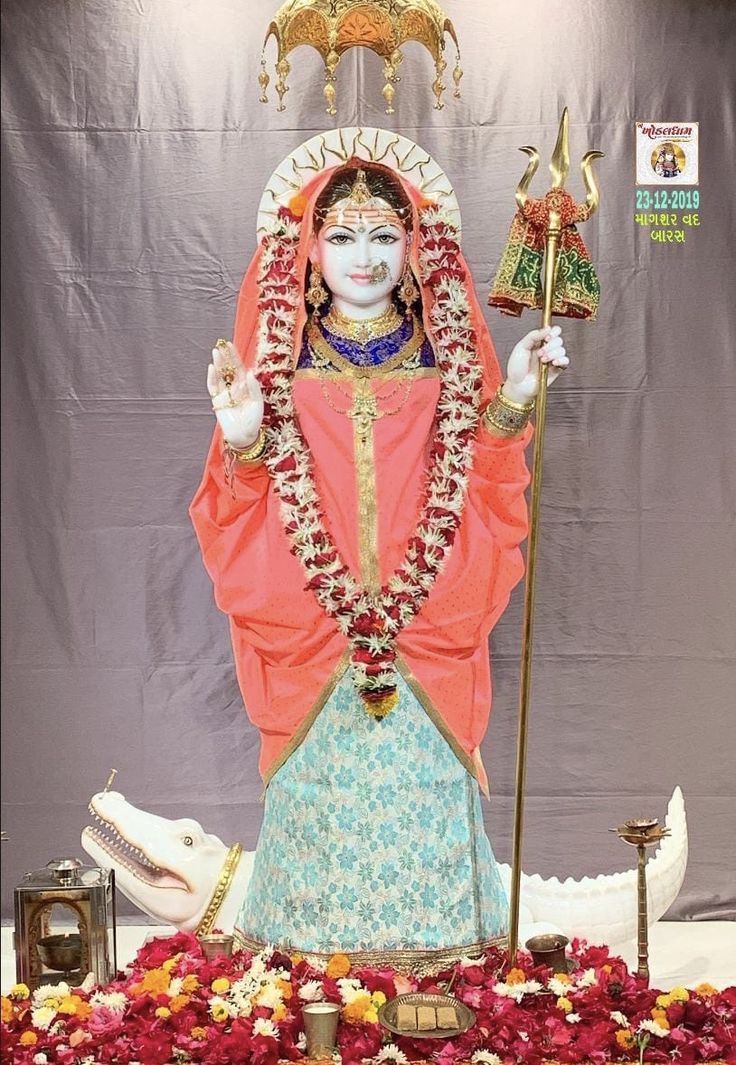 Khodiyar Maa with trident and flowers