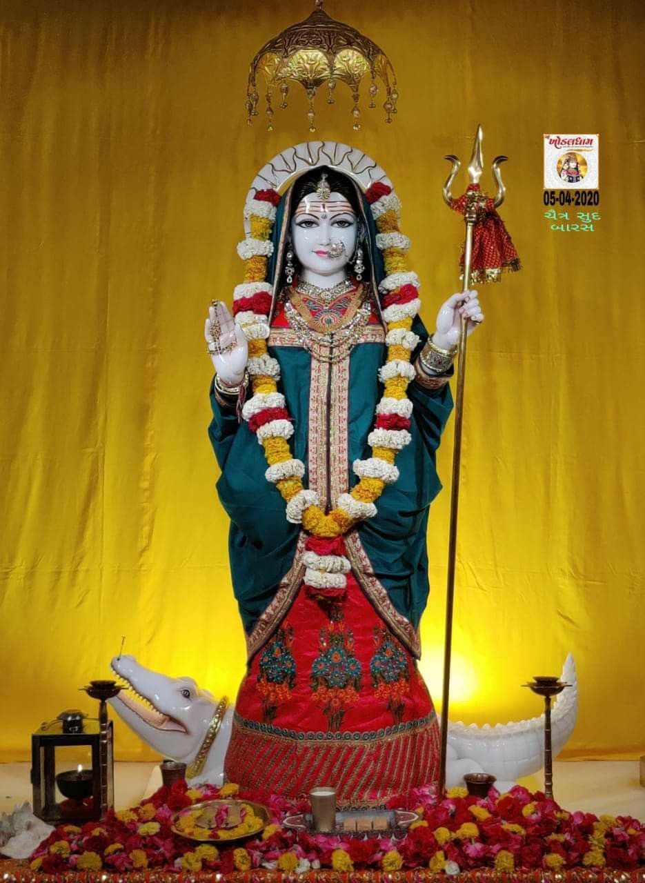 Khodiyar Maa statue with trident and flowers