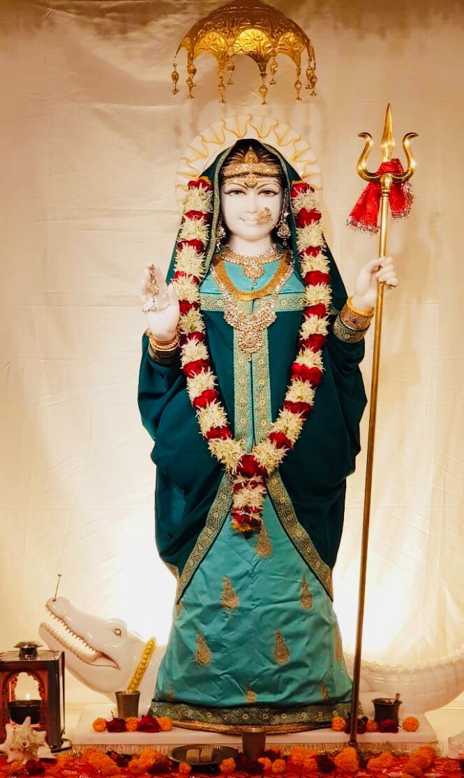 Khodiyar Maa with trident and flowers