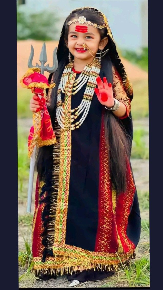 Young devotee dressed as Khodiyar Maa