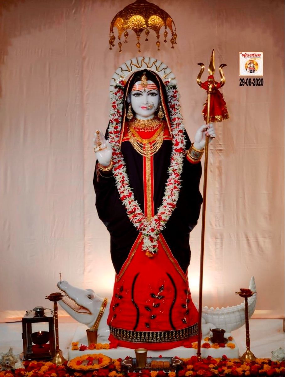 Khodiyar Maa with trident and floral garland