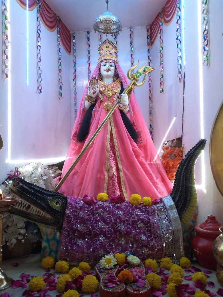Khodiyar Maa statue with flowers offerings