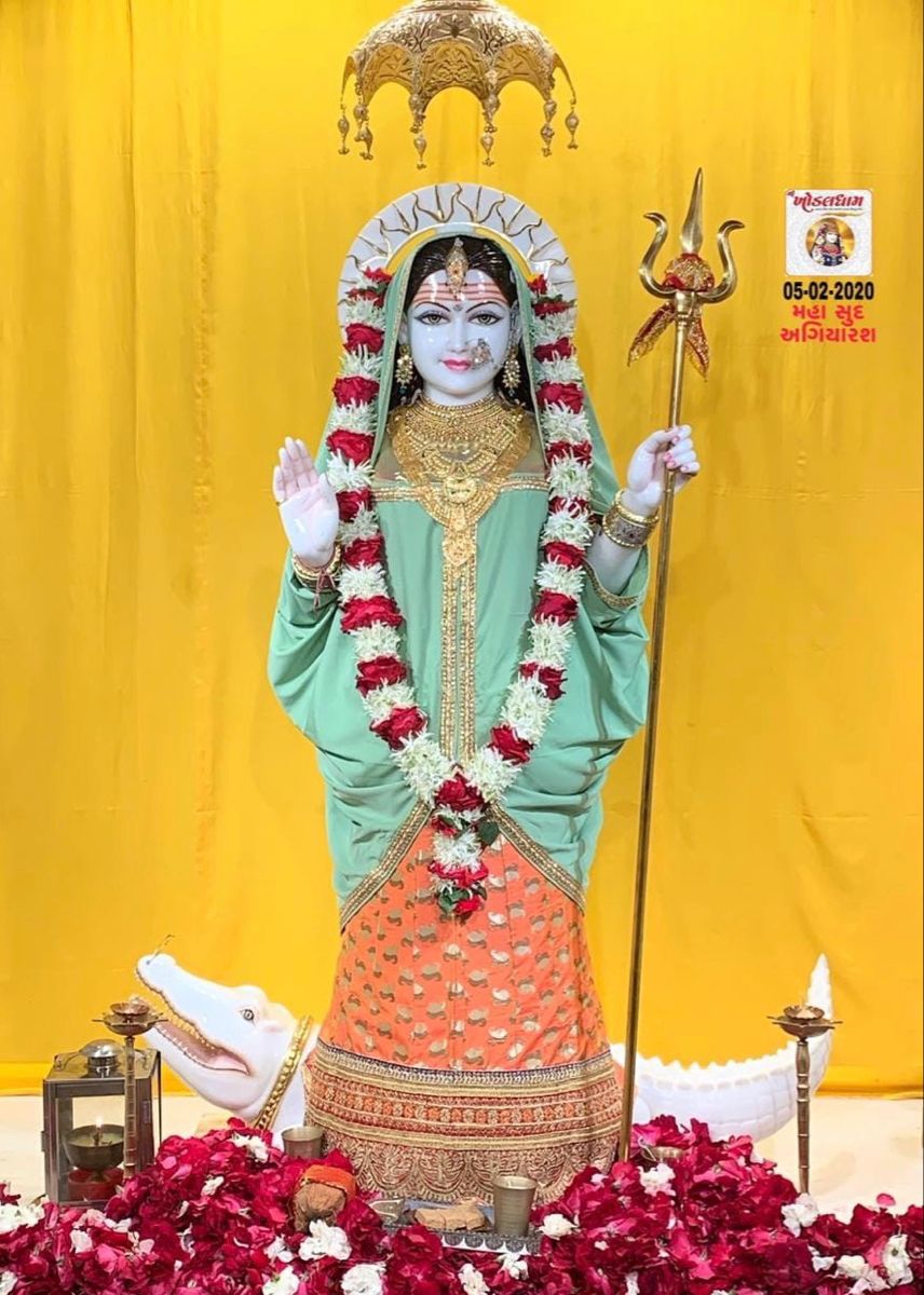 Khodiyar Maa statue with flowers and trident