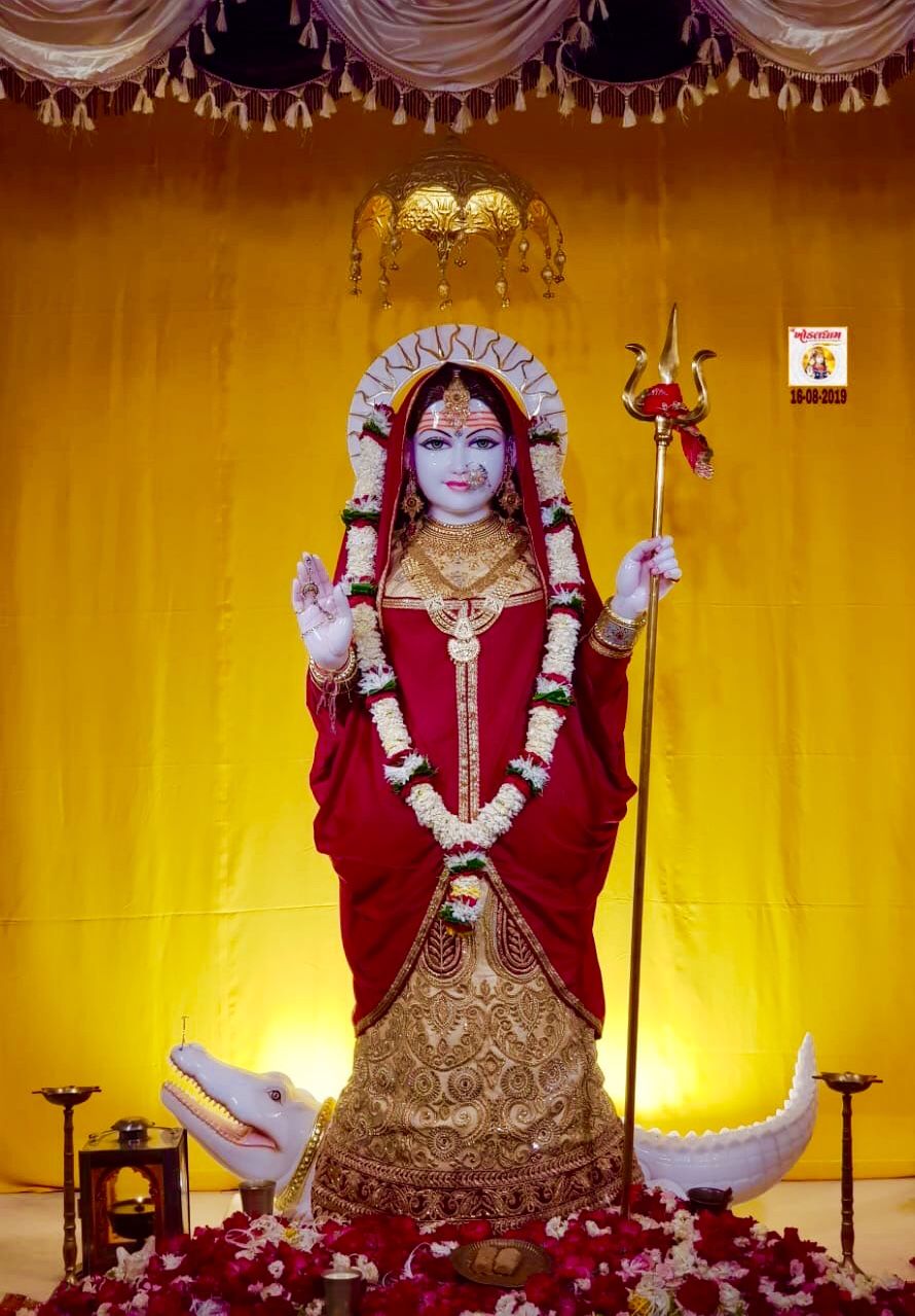 Khodiyar Maa in red sari, divine protection