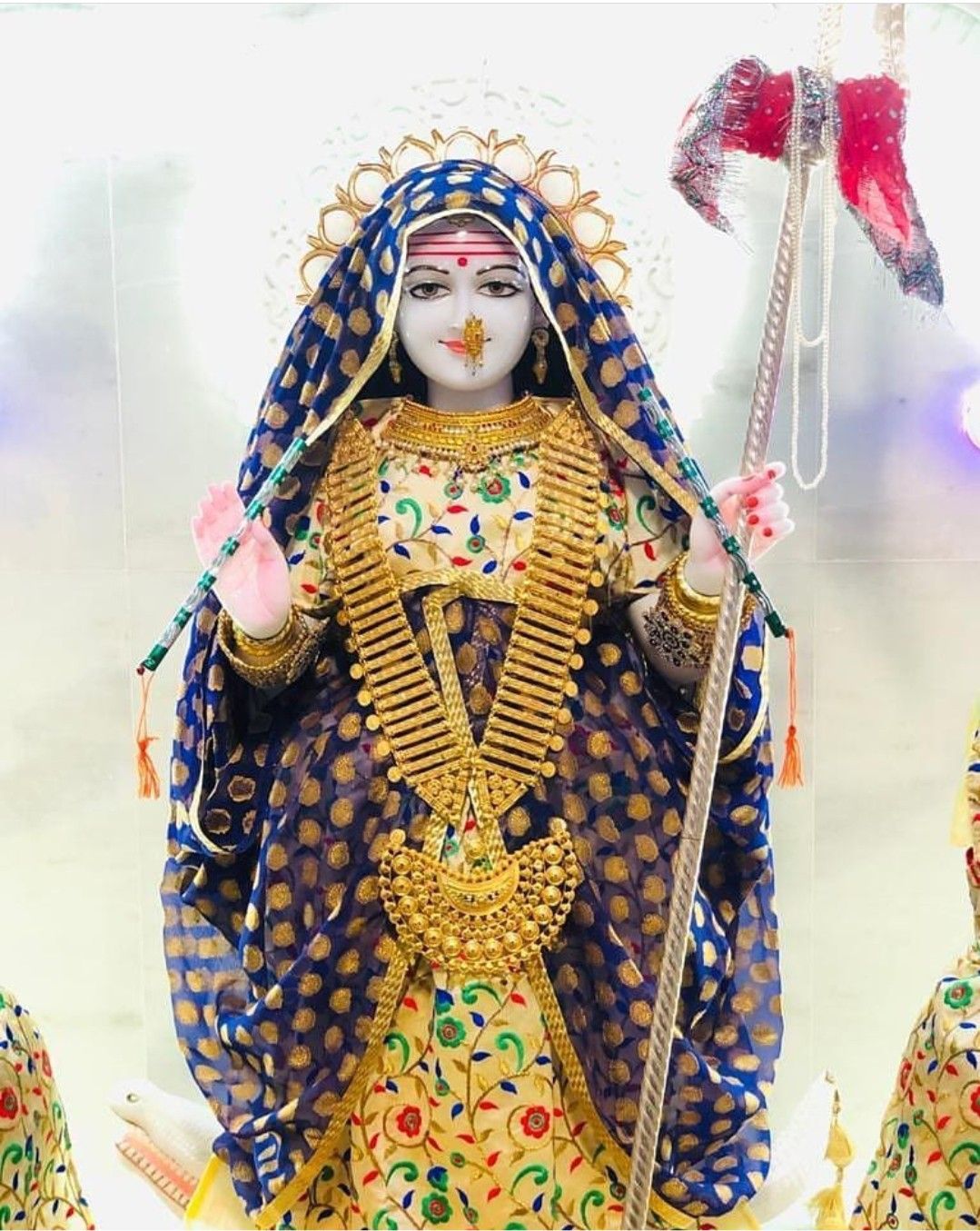 Khodiyar Maa statue adorned in gold jewelry