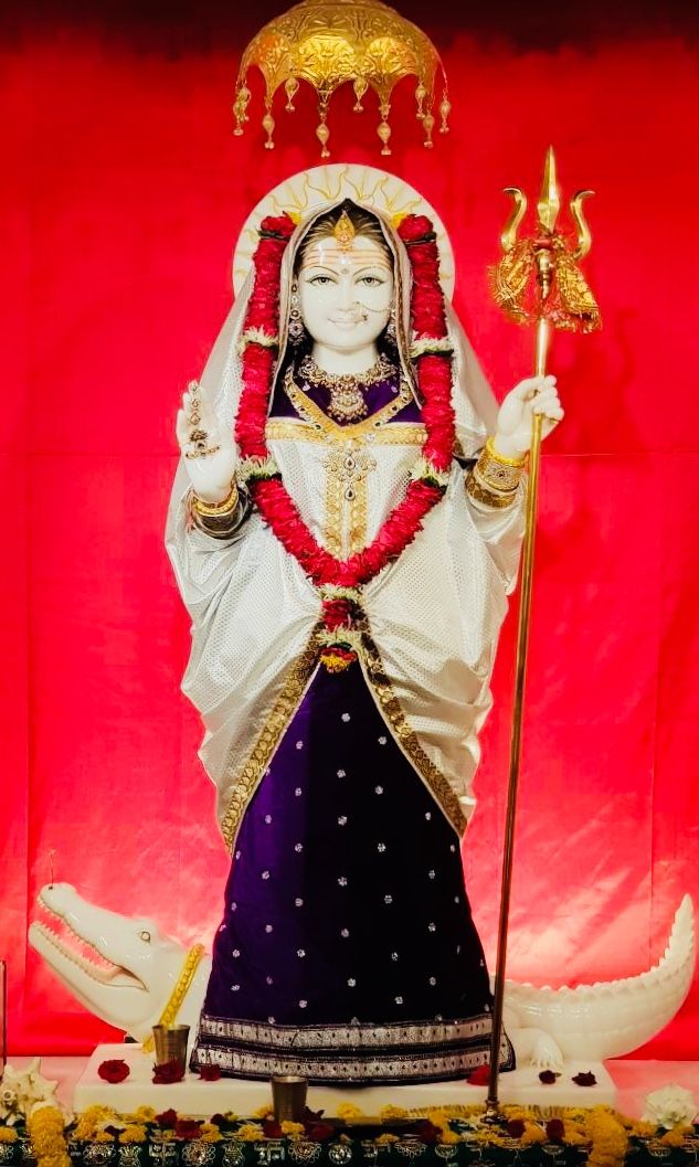 Khodiyar Maa holding a trident, divine image.