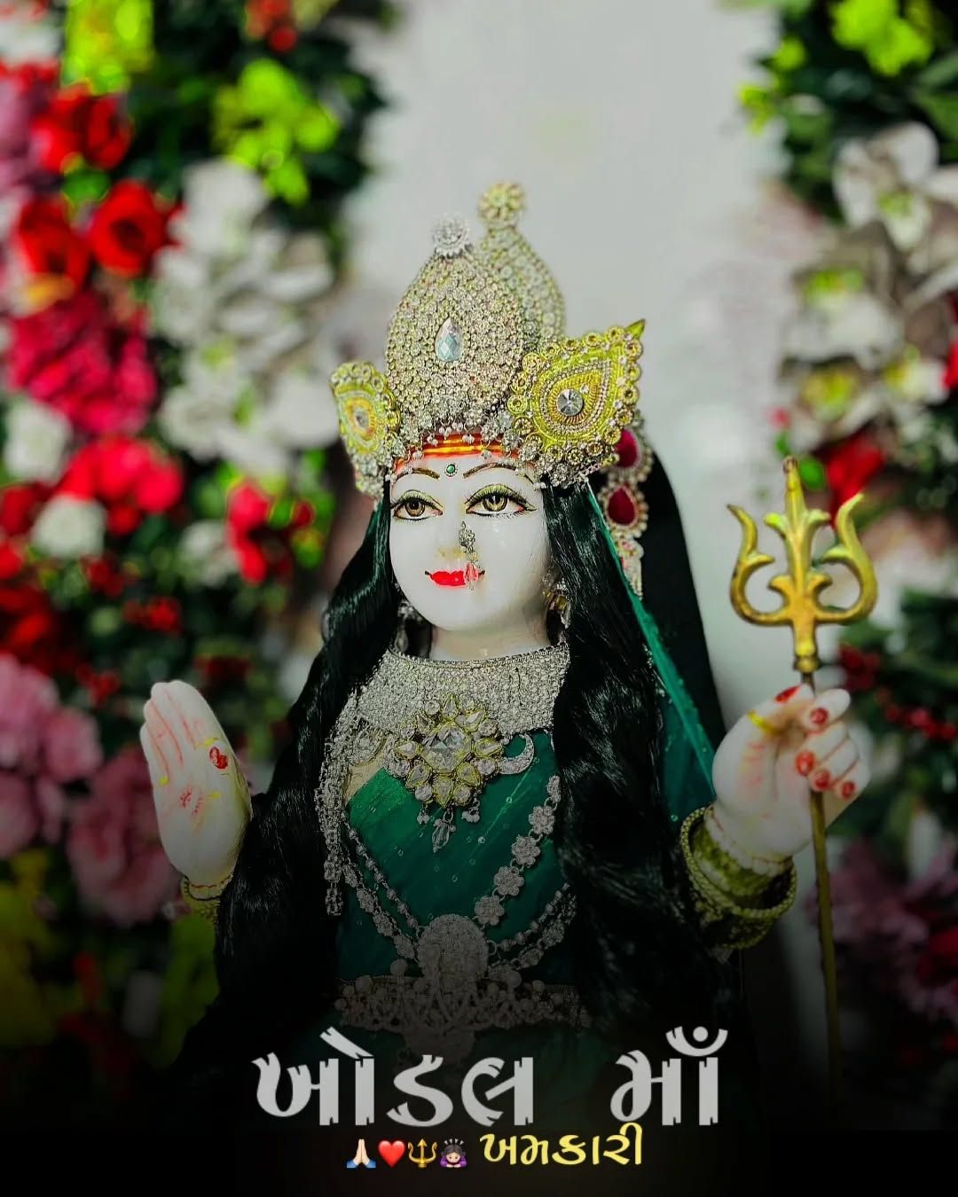Khodiyar Maa with trident and flowers
